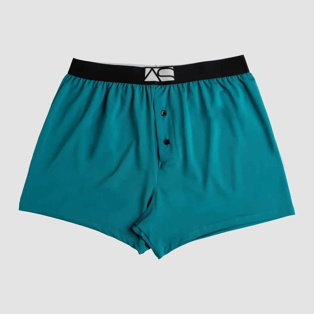 Modern boxer teal boxer shorts with black elastic waistband white logo and two front button closures