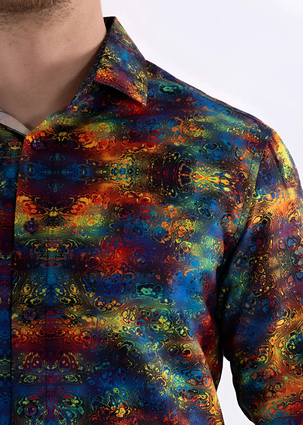 Multicolor patterned long sleeve shirt with vibrant iridescent kaleidoscopic design in blues reds oranges and greens