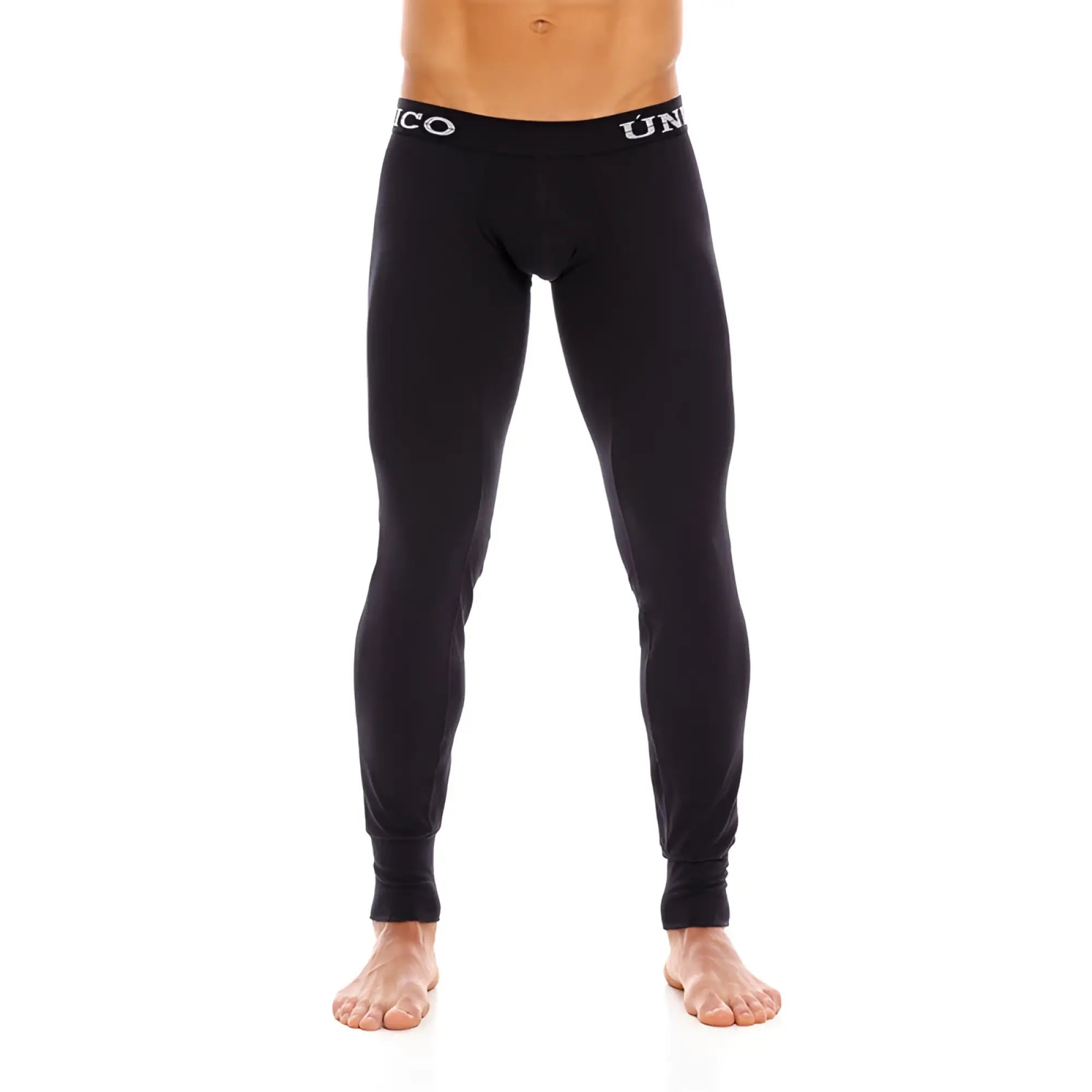 Black uniqlo compression tights with snug fit and white logo trim at waistband mondo unico cold mountain long johns