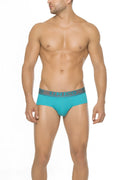 Mundo Unico Quimbara brief underwear in turquoise with a gray waistband featuring white brand name in size M