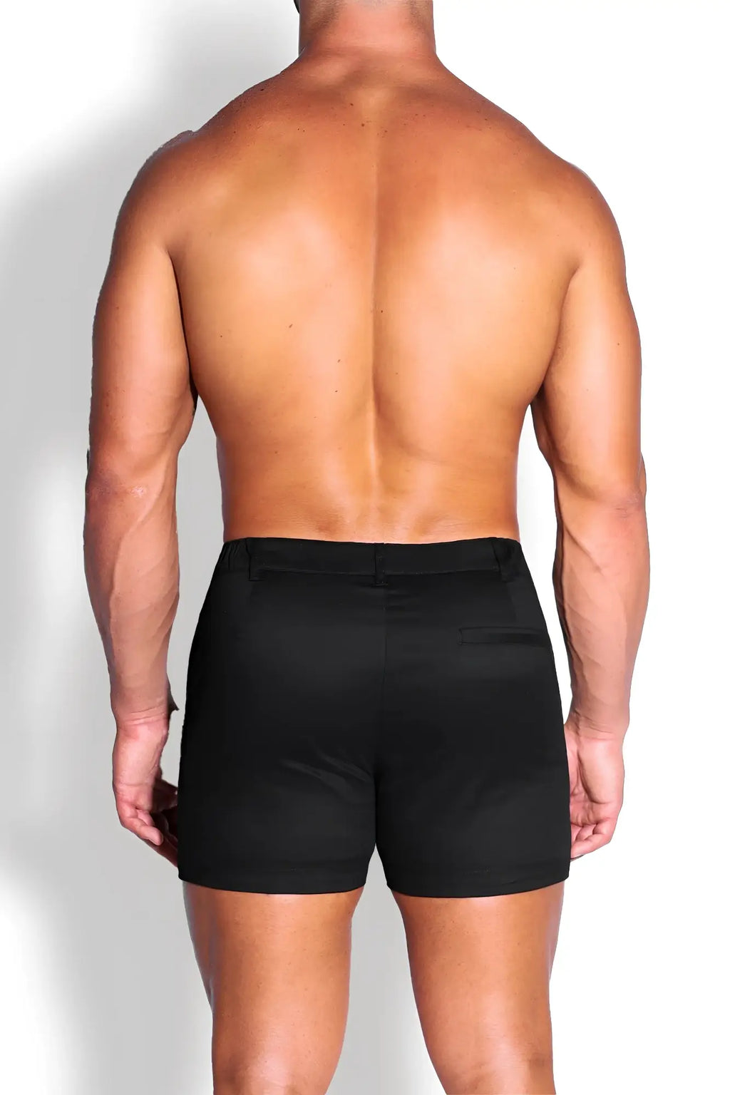 Muscle-fit men’s 4 inch stretchy chino shorts in jet black with a sleek form-fitting design perfect for athletic wear