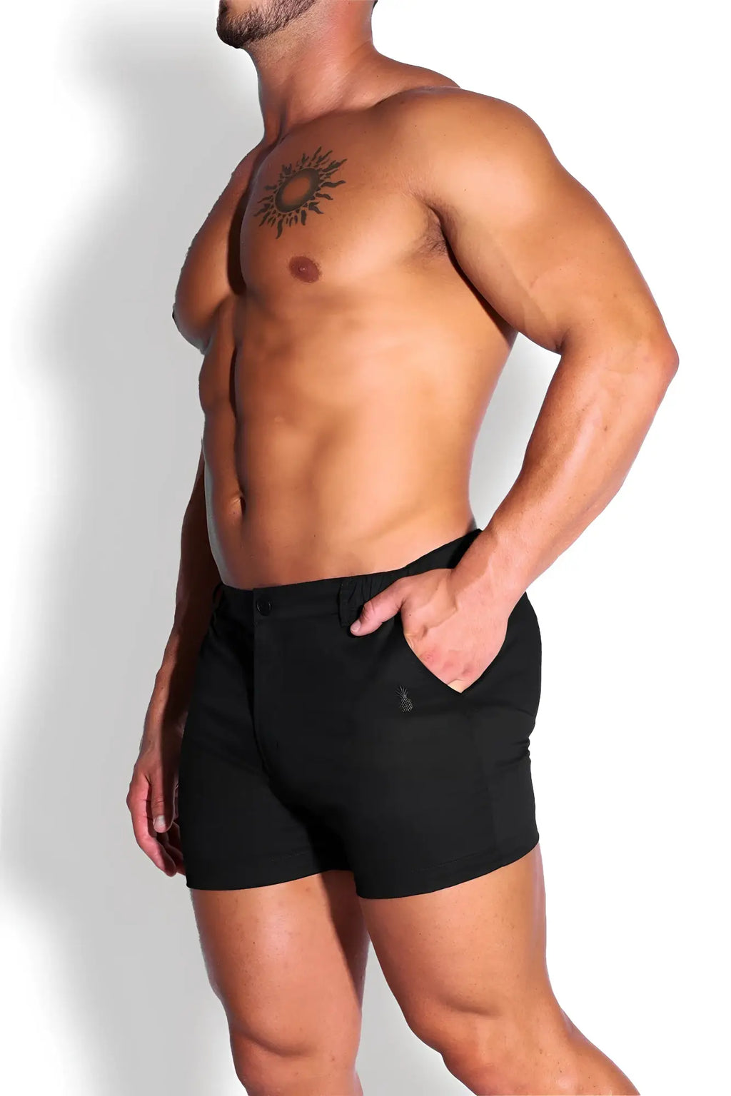 Muscle-fit men’s 4 inch stretchy chino shorts in jet black with sleek design and subtle branding on side pocket