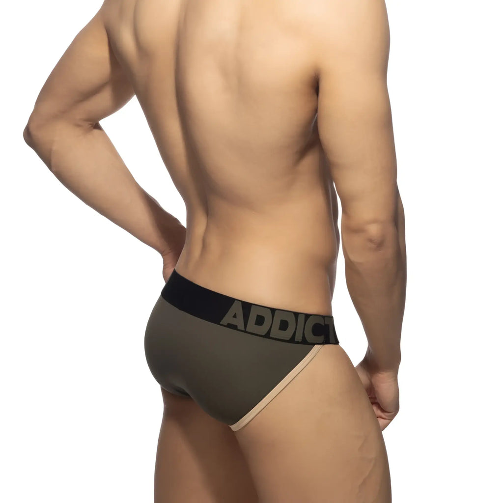 Olive green naked feeling bikini brief with black waistband and bold gray addict lettering for comfortable wear