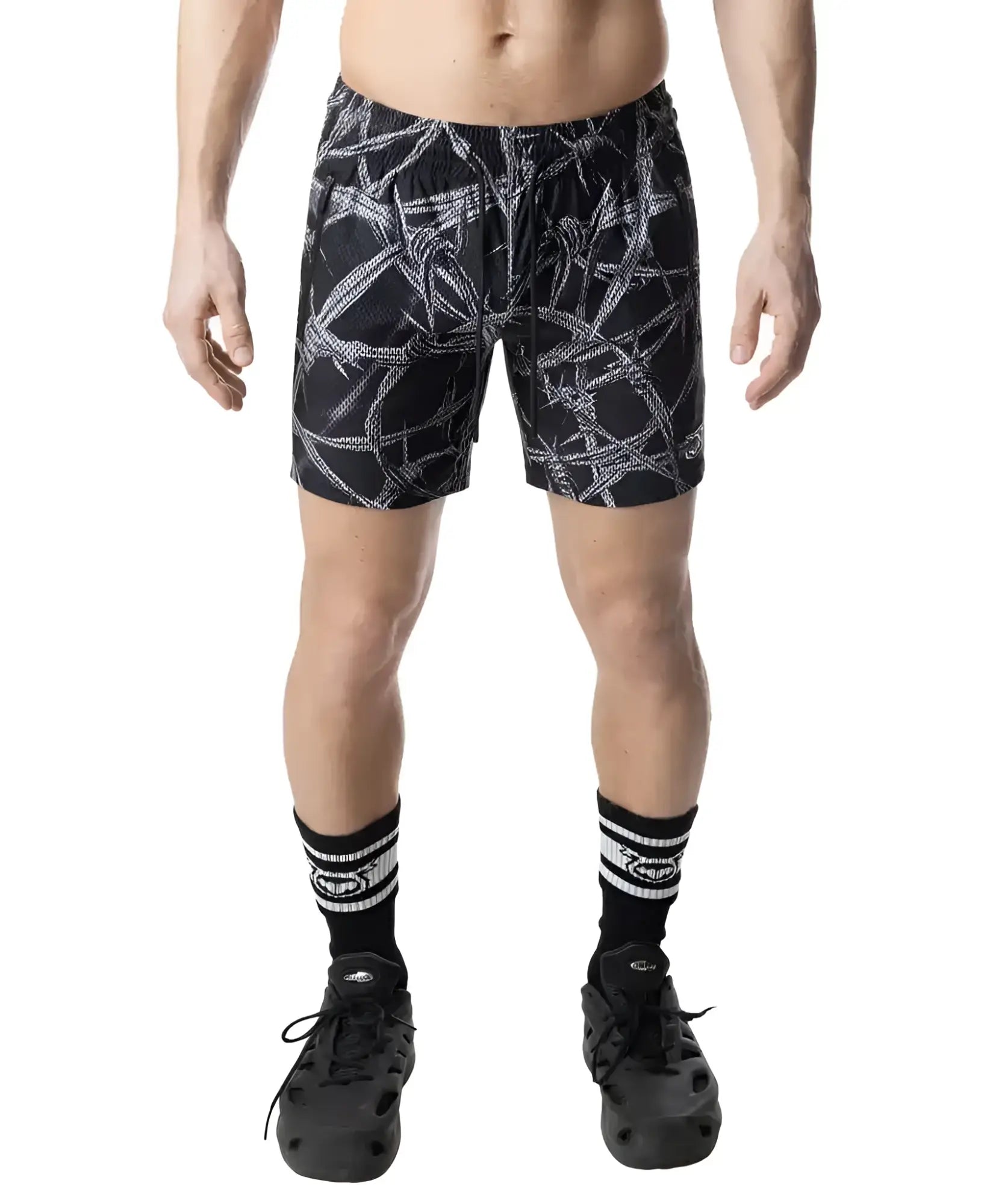 Black barbed wire rugby shorts featuring a white rope-like pattern designed for athletic use
