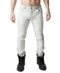 Light gray slim-fit denim jeans with classic five-pocket design and rolled cuffs in bleached style
