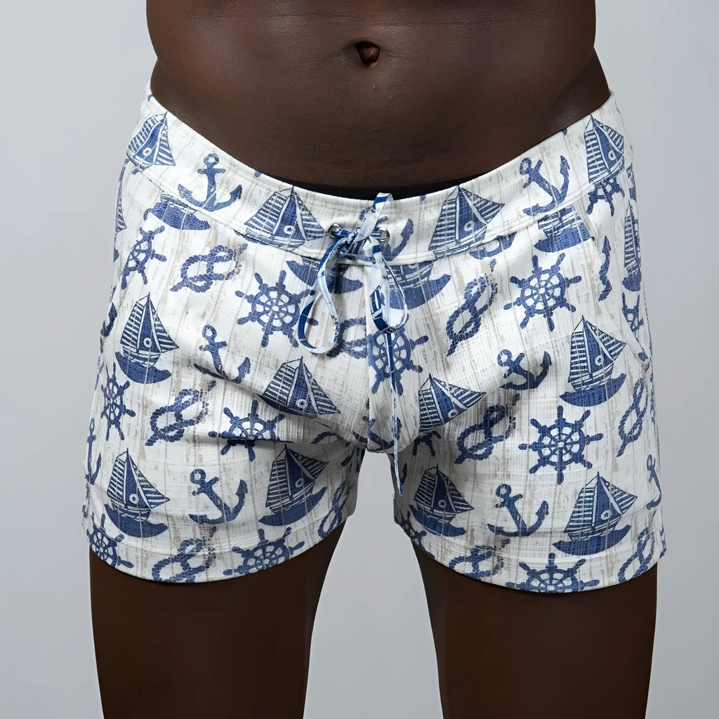 White linen nautical linen texture shorts with blue anchor sailboat and ship wheel pattern
