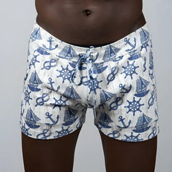 White linen nautical linen texture shorts with blue anchor sailboat and ship wheel pattern