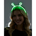 Green neon alien headband with glowing antennae made of flexible plastic for fun costume or party use