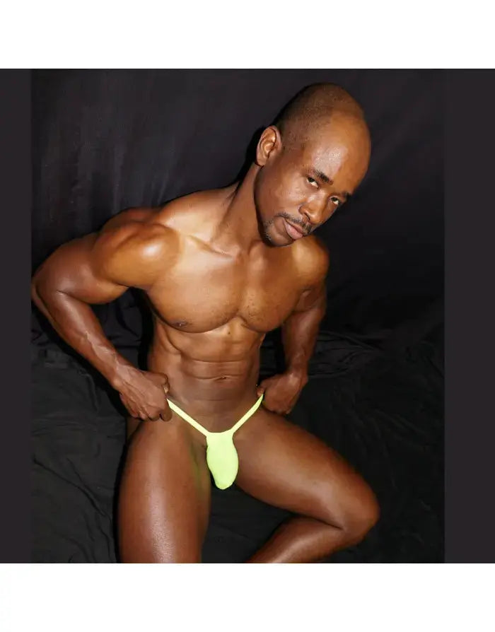 Neon yellow ribbed G-string thong underwear by Arroyman featuring a minimal design and soft fabric worn by a model.