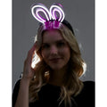 Purple neon bunny ears headband made of glowing flexible material for fun party and costume use
