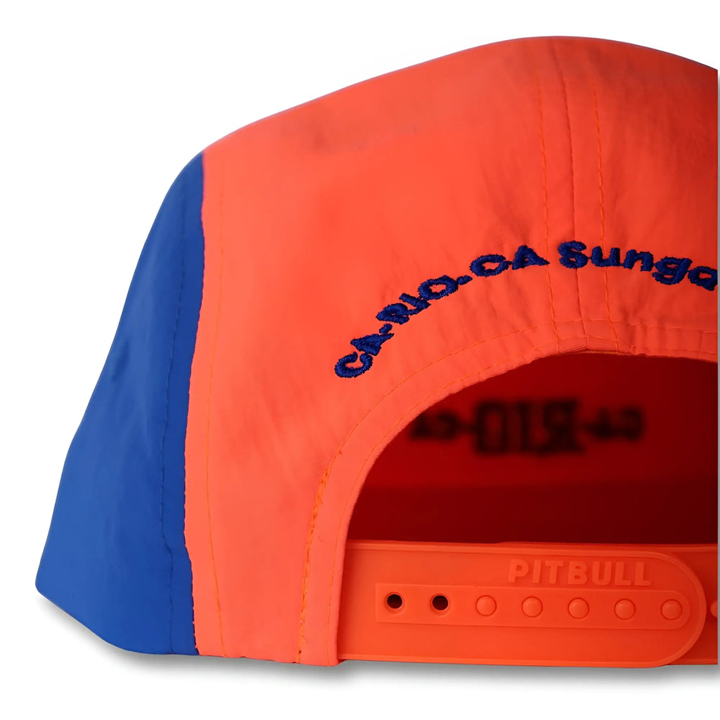 Bright orange and blue neon dream bike cap hat with embroidered cario ca sunga text on the back side