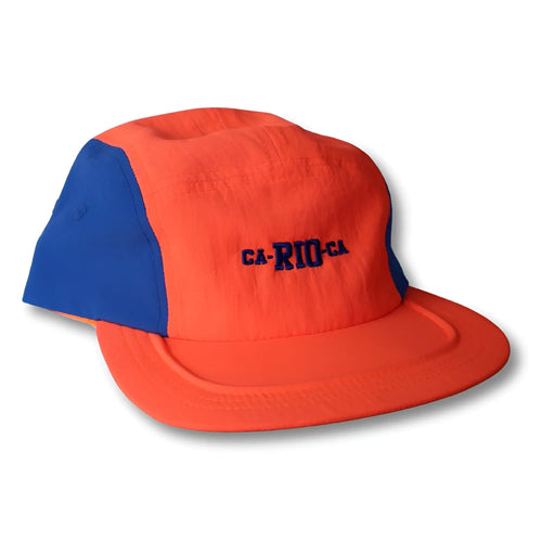 Vibrant orange and blue neon dream bike cap hat with navy ca-rio-ca embroidery in five-panel design