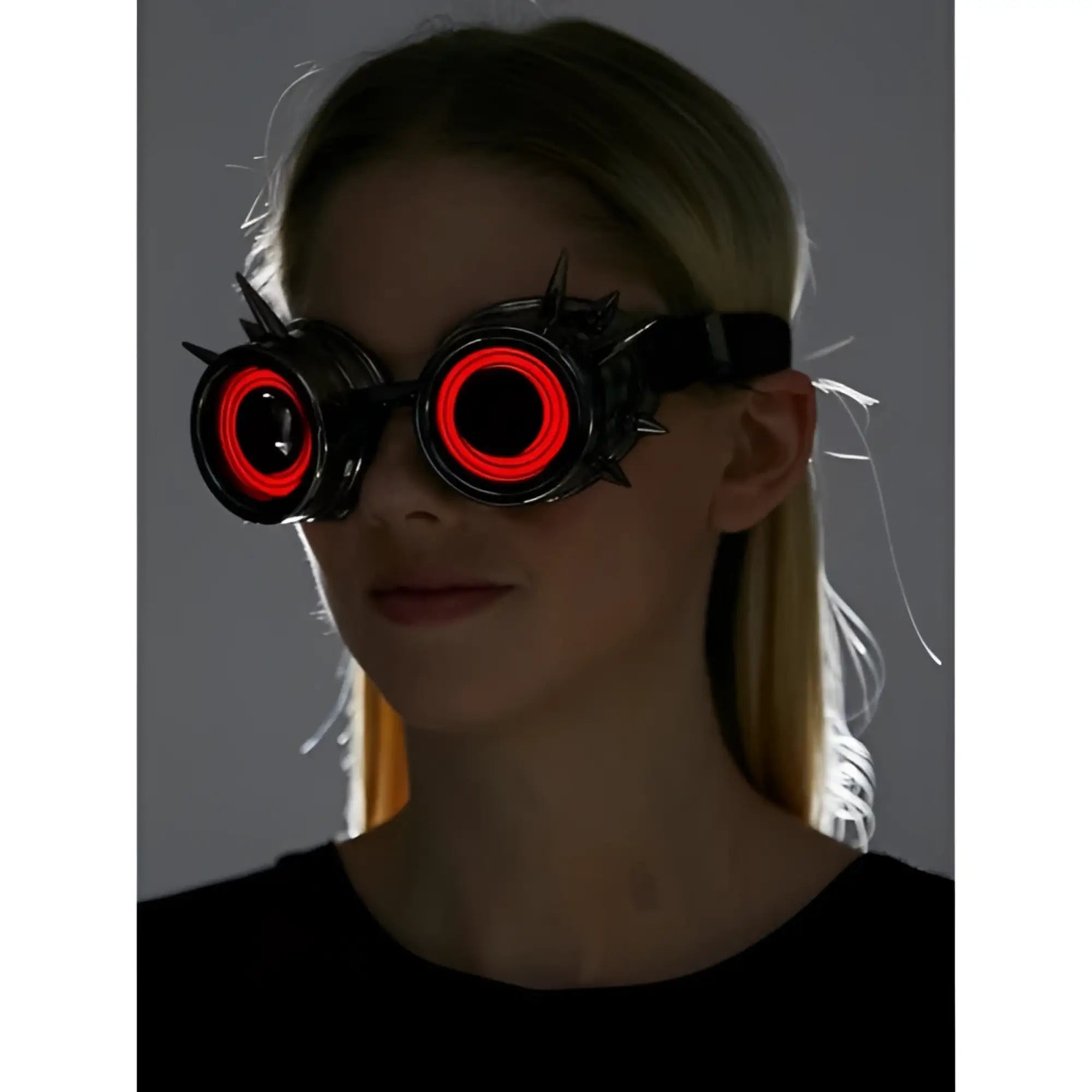 Black spiked neon light up goggles with glowing red circular lights for futuristic cosplay and rave wear