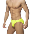 Neon swim bikini bright neon yellow swim trunks with sleek form-fitting design and small logo on the waistband