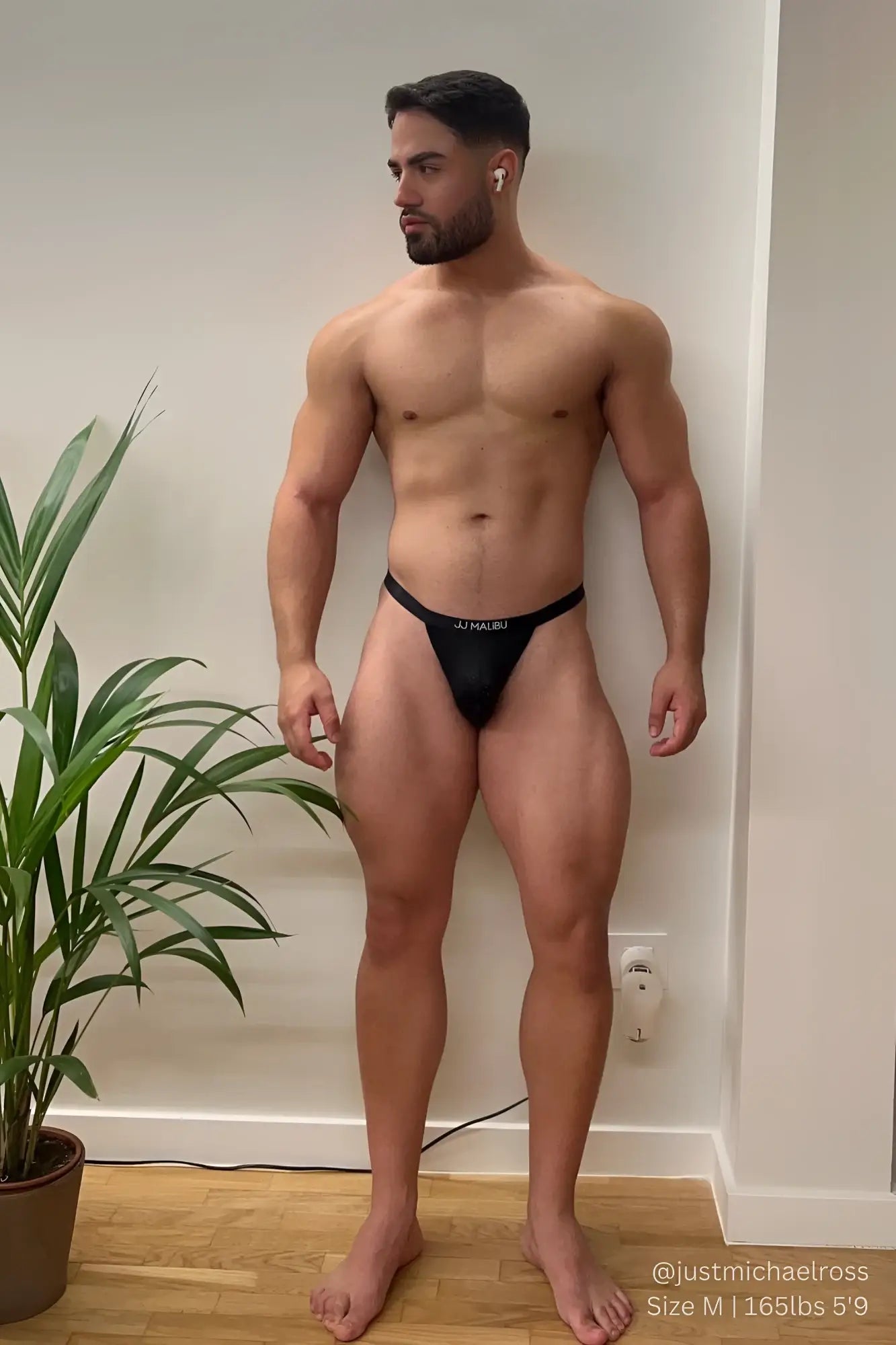 Black j now-or-never mesh thong in black showing breathable mesh material and sleek thong design from the back side