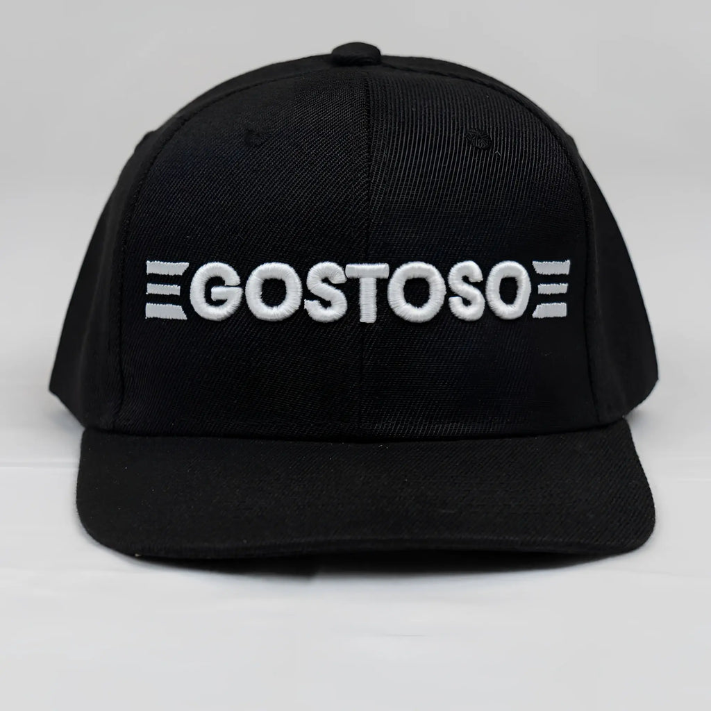 Black snapback cap with white embroidered 3D puff gostoso logo and triple horizontal stripes on each side