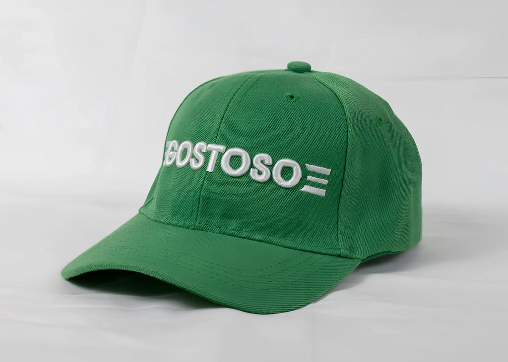 Green baseball cap with white 3D puff gostoso logo and three horizontal stripes embroidered on the front