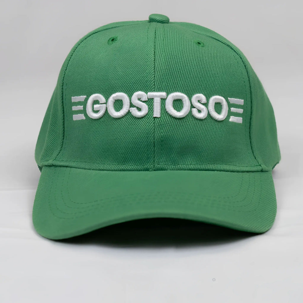Green baseball cap with white 3d puff gostoso stripes logo embroidered on front panel