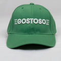 Green baseball cap with white 3d puff gostoso stripes logo embroidered on front panel