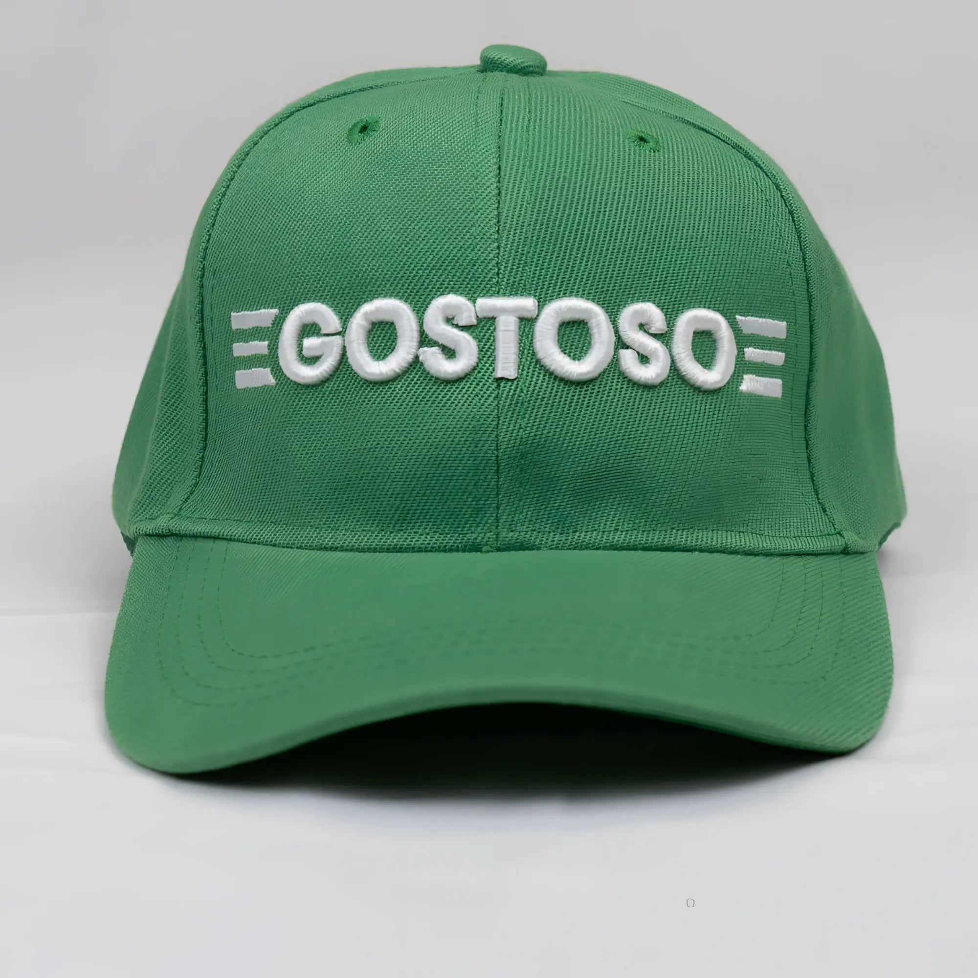 Green baseball cap with white 3d puff gostoso stripes logo embroidered on front panel
