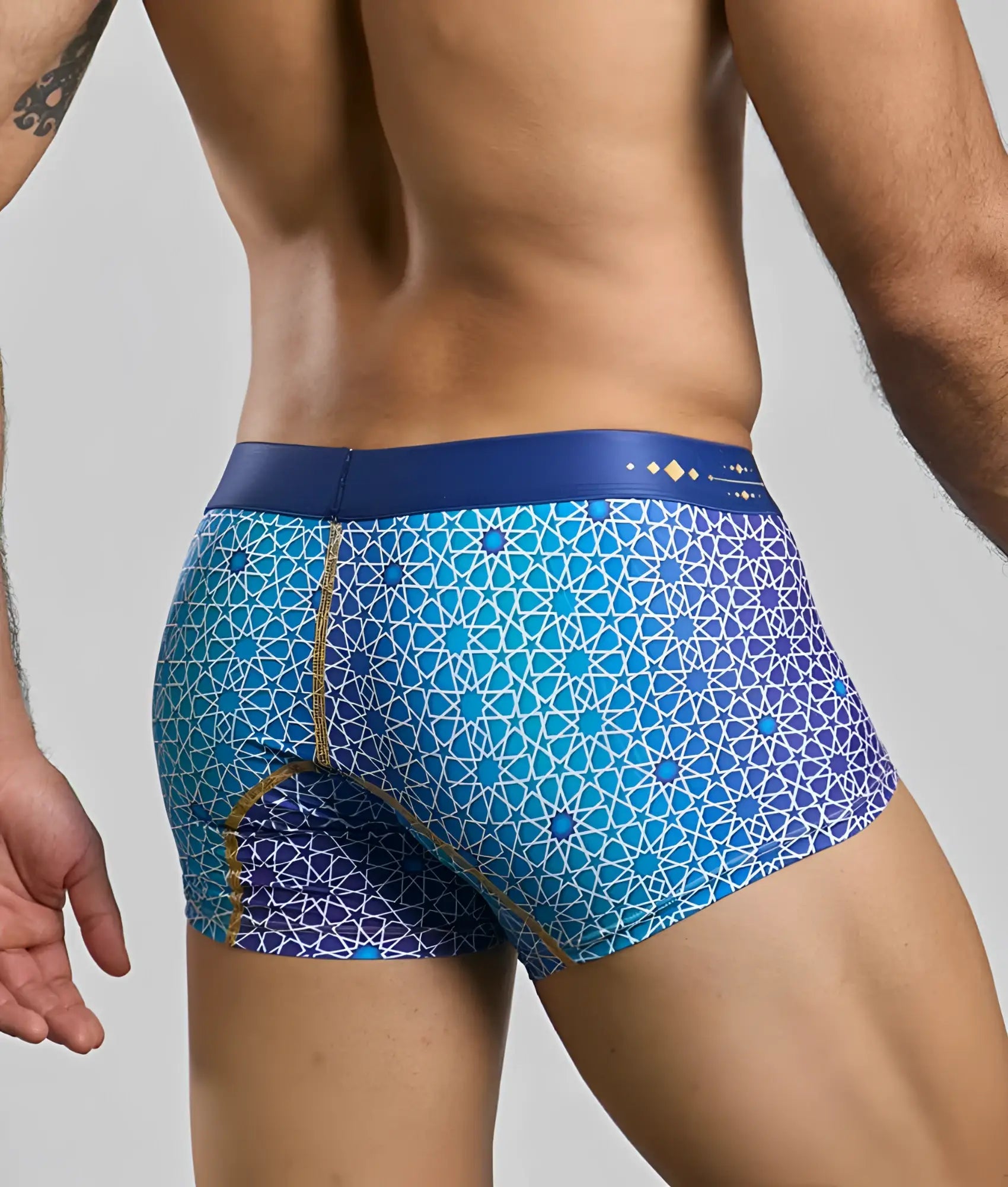 Blue and purple geometric-patterned men’s boxer briefs with navy waistband new malebasics trunk hipster front view