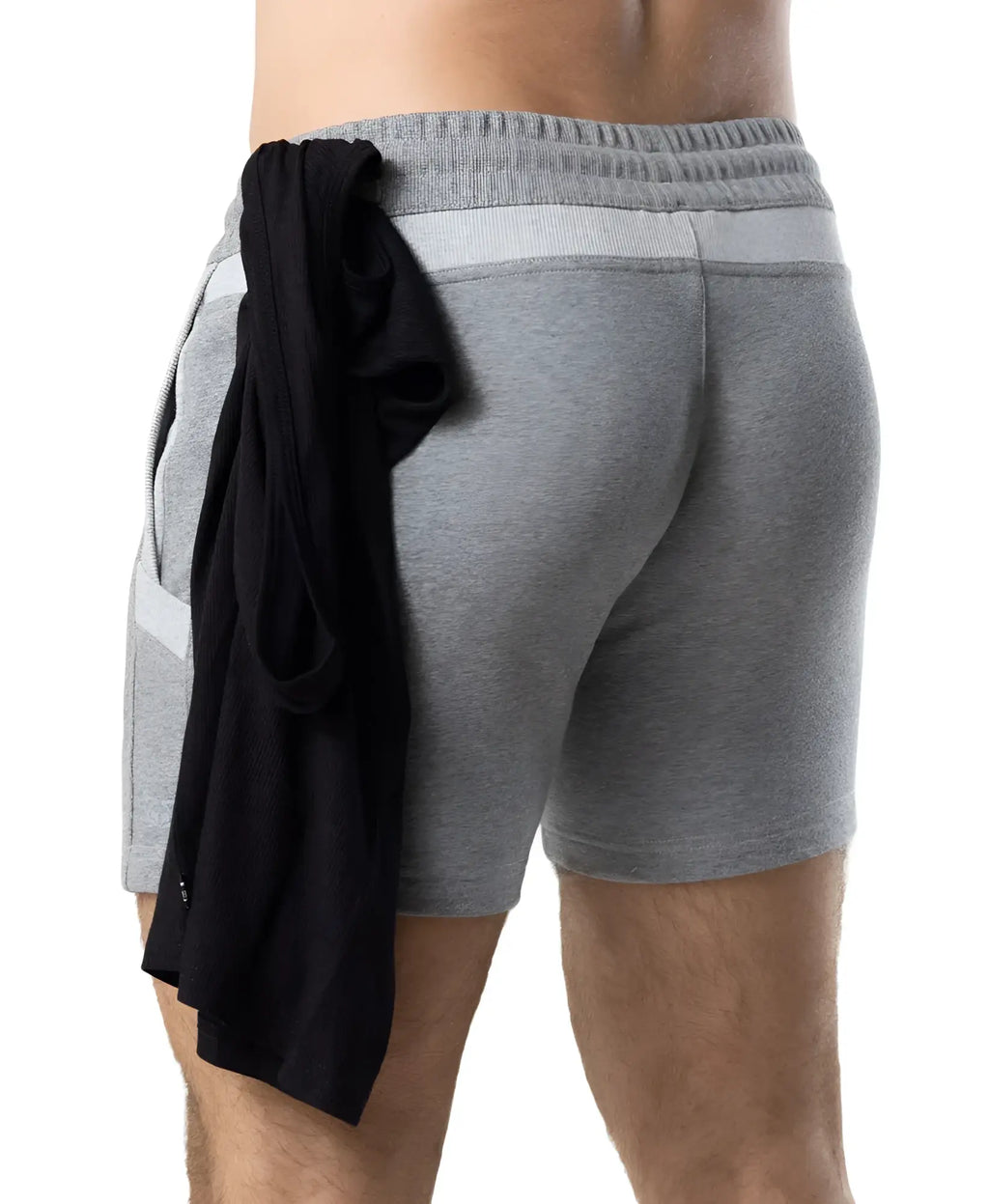 Gray heathered nexus rugby shorts with ribbed waistband and side pockets shown from the back with black garment tied