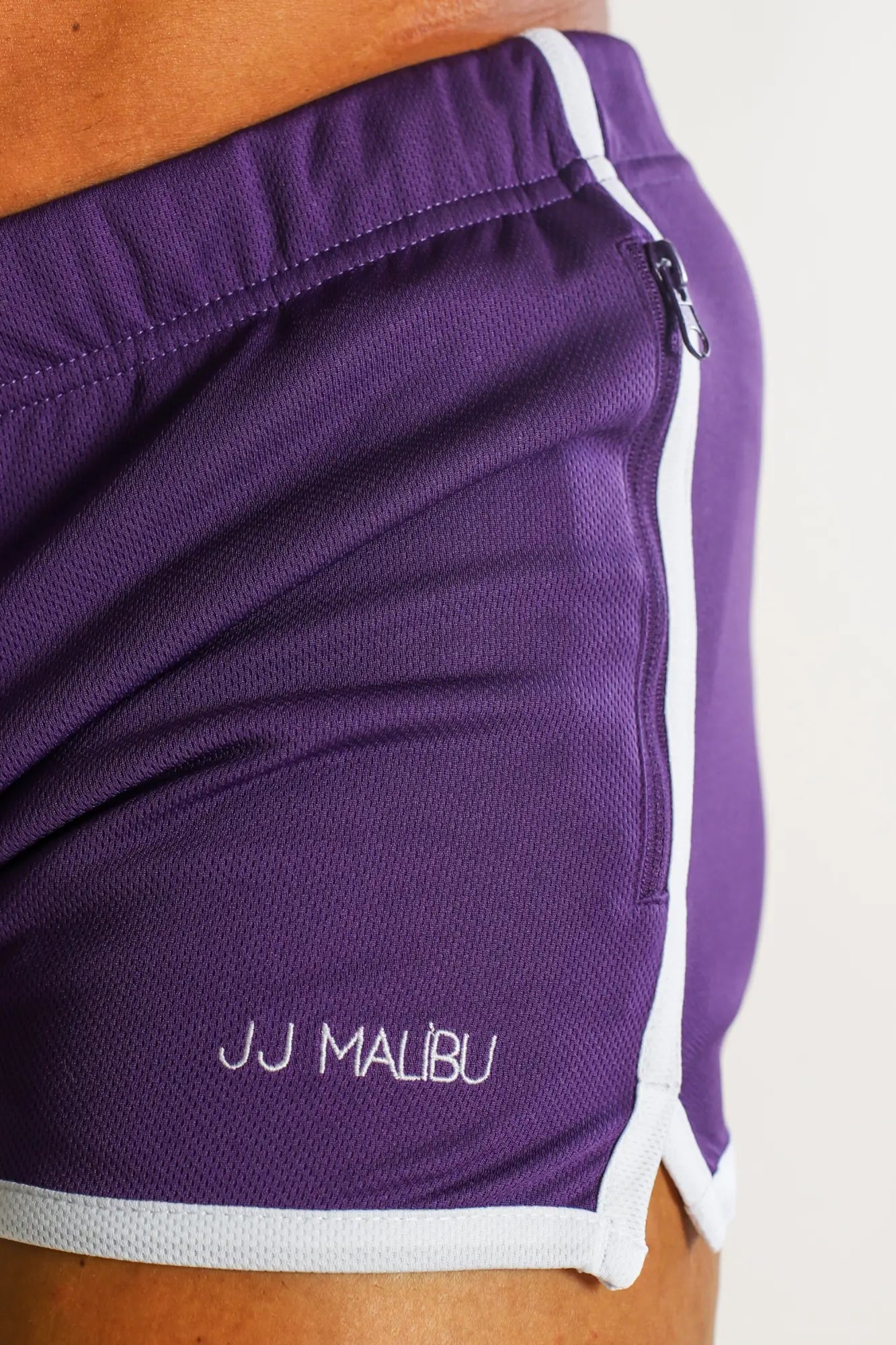 Purple for-the-night 2 inch gym short shorts with white trim and side zipper featuring jj malibu embroidery