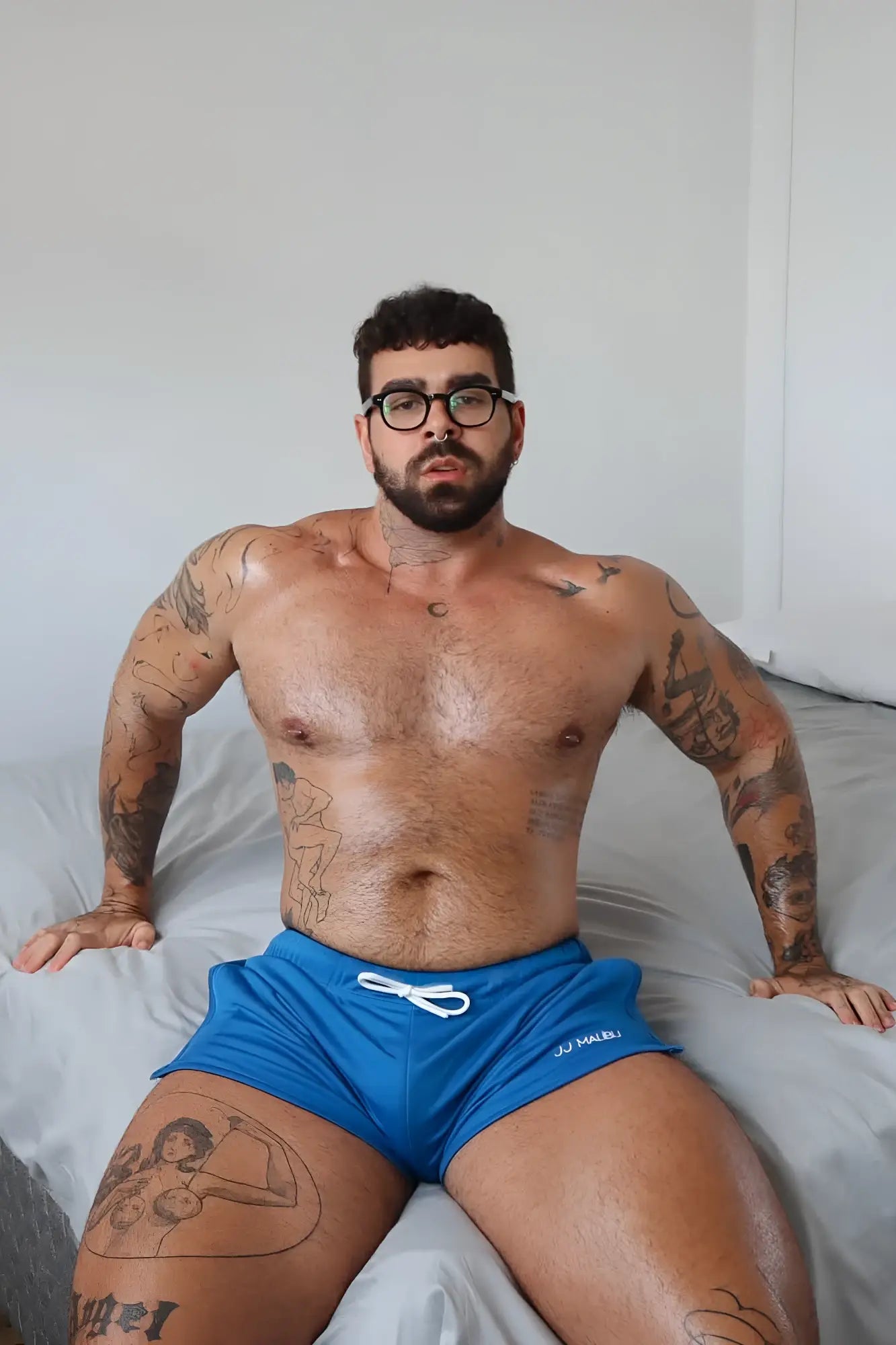 For-the-night 2 inch solid blue gym shorts with white drawstring and subtle waistband branding for athletic use