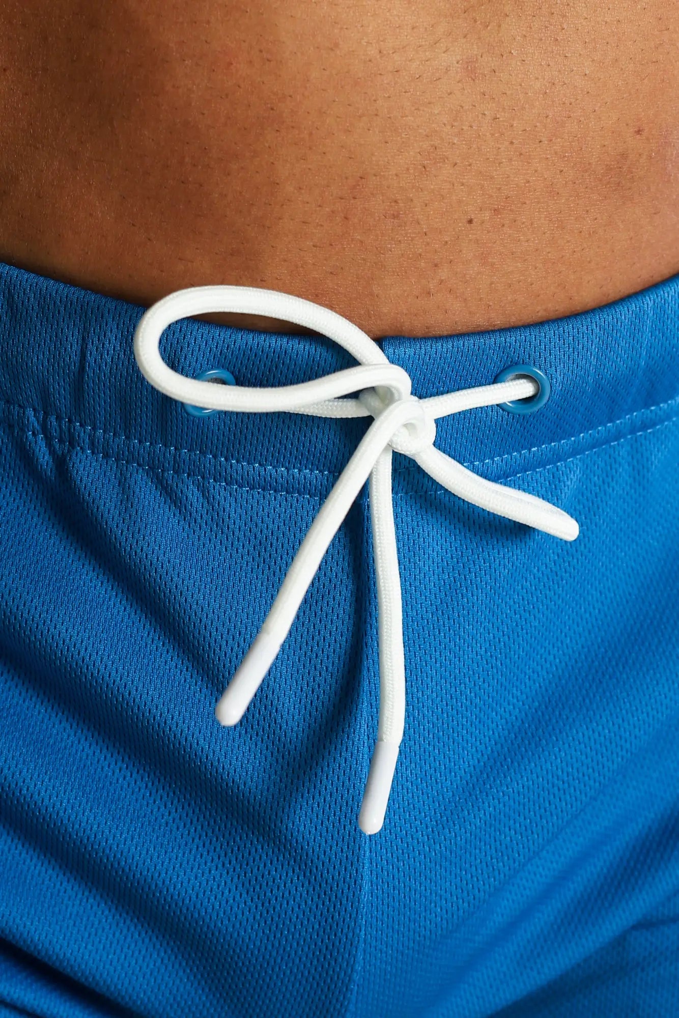 Bright blue for-the-night 2 inch gym short shorts with a white drawstring tied in a bow at the waist