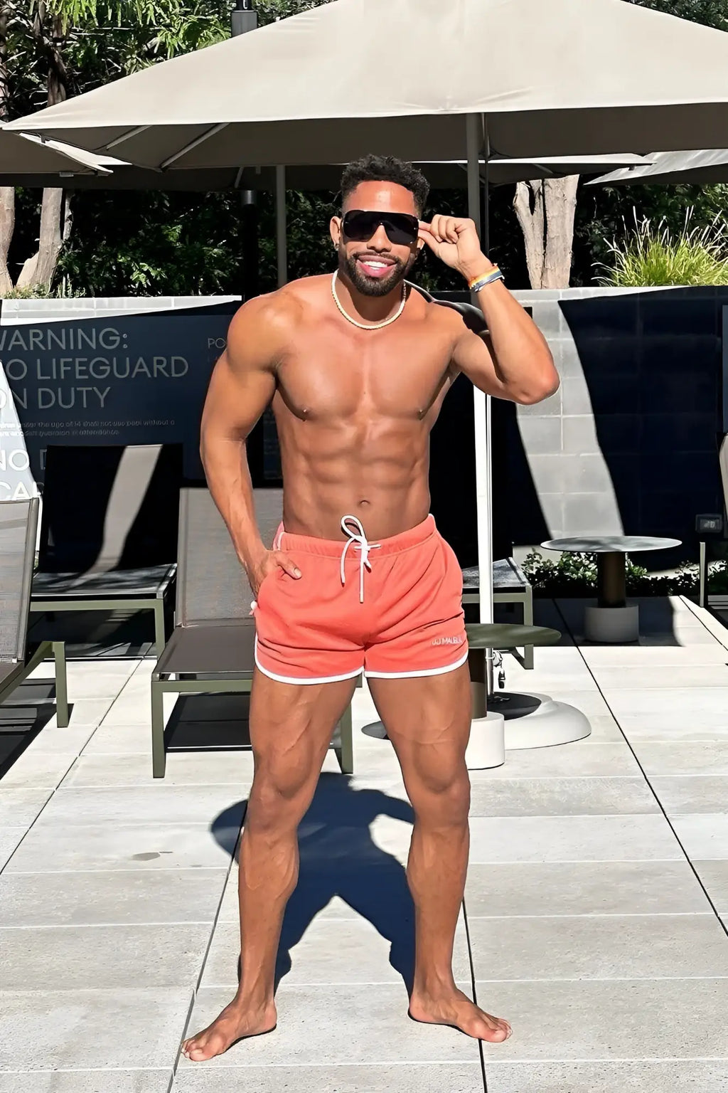 For-the-Night 4 inch gym short shorts in tangerine orange with white trim and drawstring for active wear