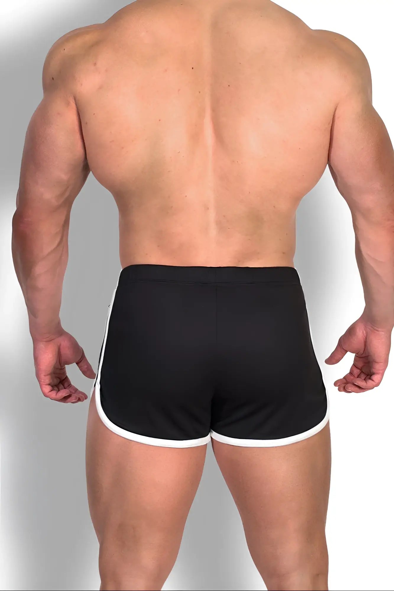 Nightcall elastic waist 3 inch short shorts in midnight black with white trim and elastic waistband for athletic use