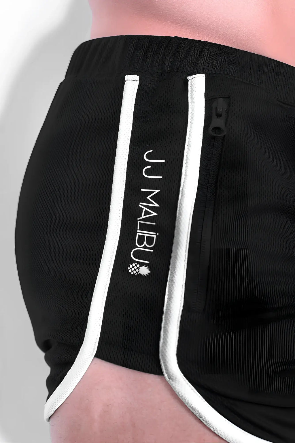 Black athletic shorts with white piping and a vertical jj malibu logo in elastic waist 3 inch short design