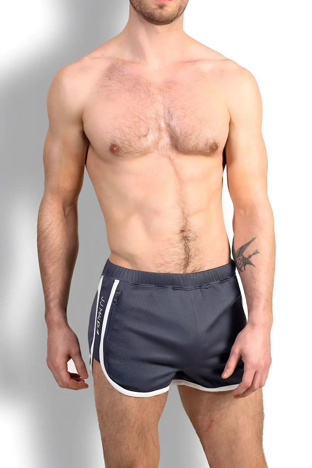Nightcall elastic waist smokey grey shorts with white side stripes subtle textured fabric and french branding on leg