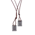 Two dark brown leather cord necklaces with rectangular silver tonal Nossa Senhora do Carmo scapular pendants for men