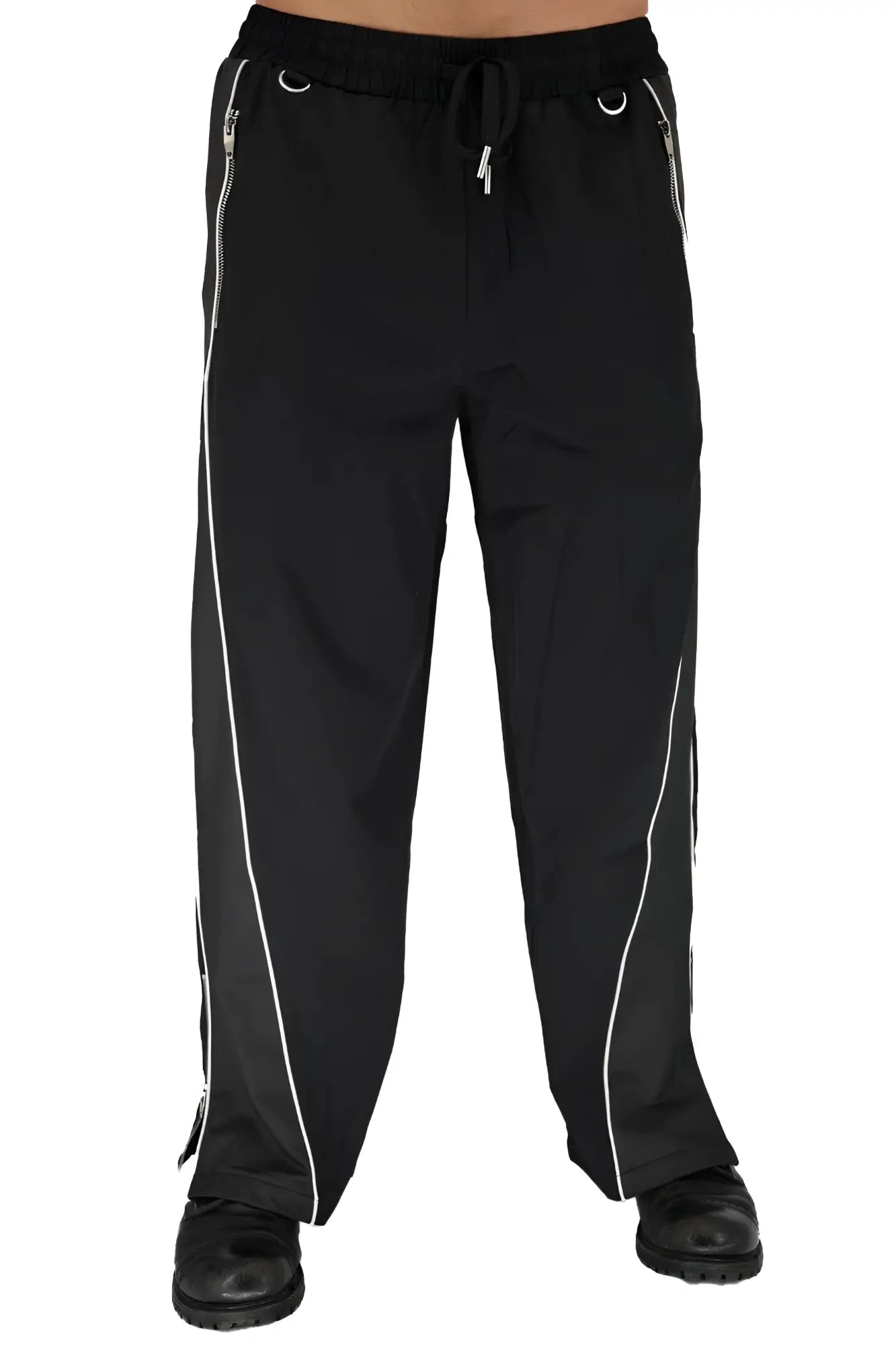 Nsa track pants in black athletic fabric with white zipper-trimmed side panels and silver metal eyelets