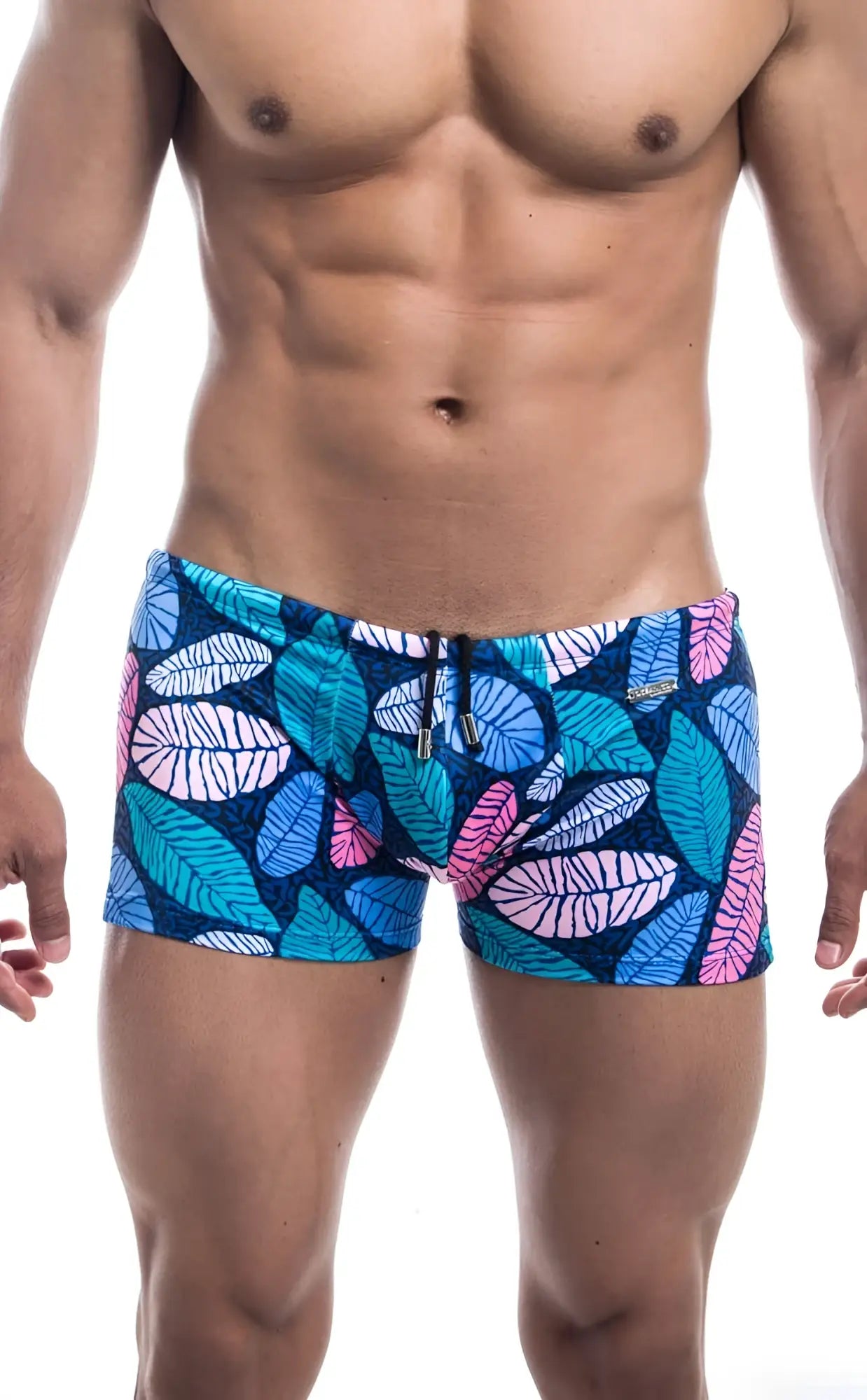 Oceanico Square Cut swim trunks with blue and pink leaf pattern on dark blue base for beachwear