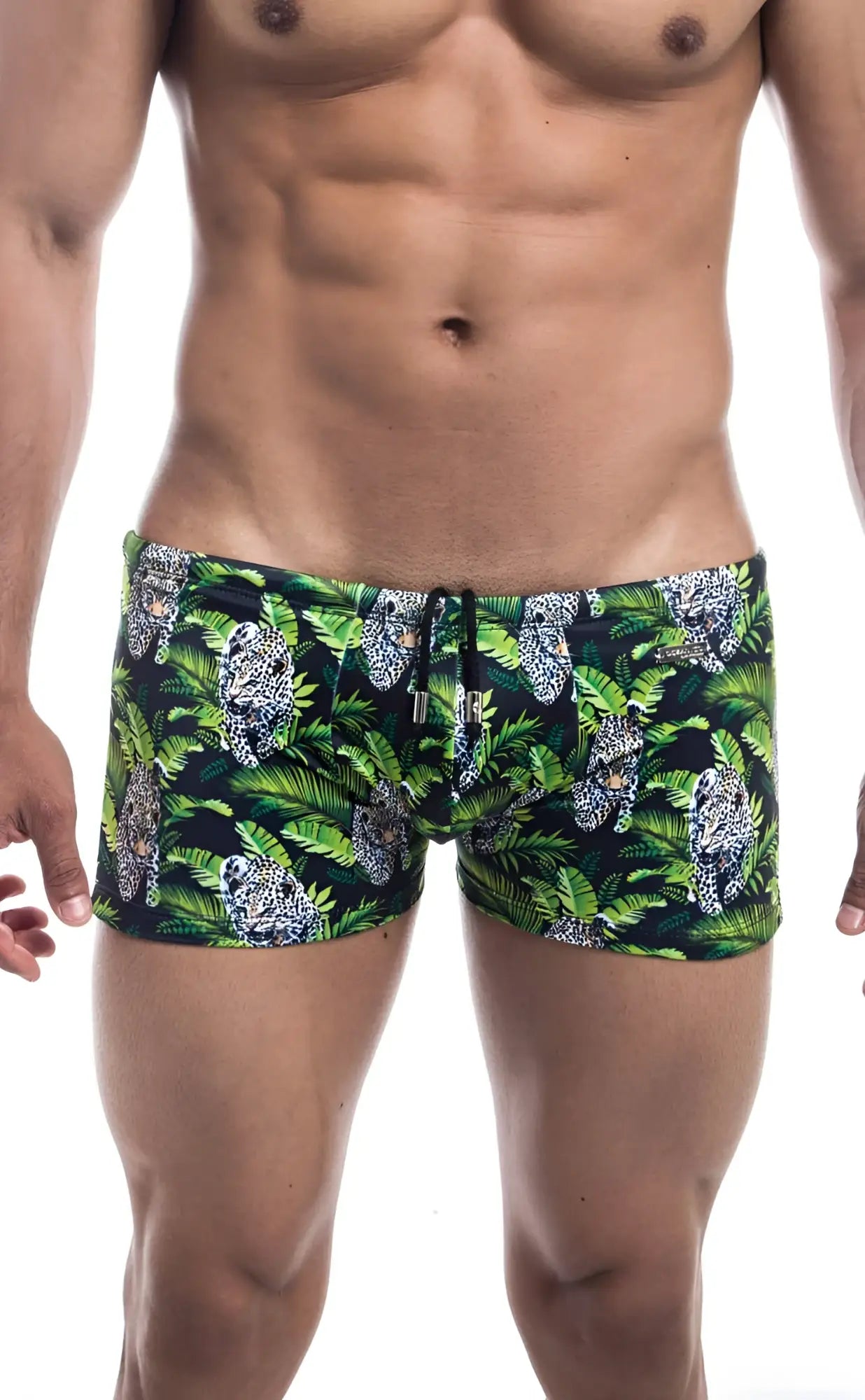 Oceanico square cut green and black swim trunks with a vibrant jungle pattern of leopards and tropical leaves