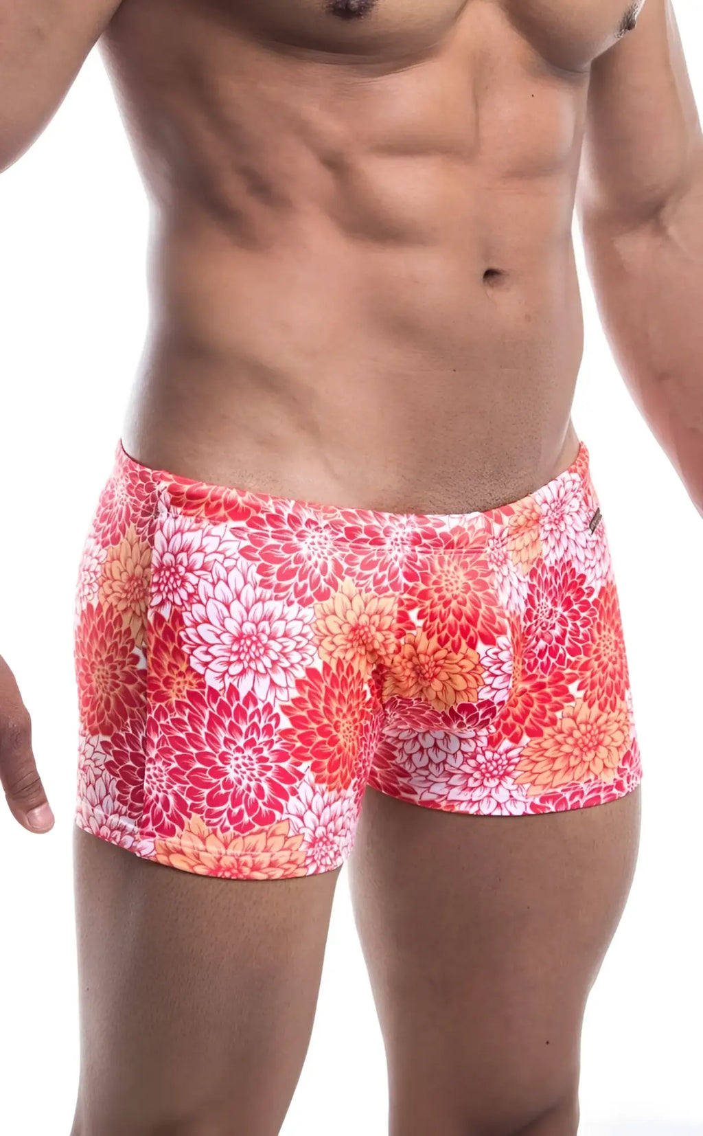 Oceanico square cut swim trunks in vibrant pink red and orange floral pattern designed for beachwear