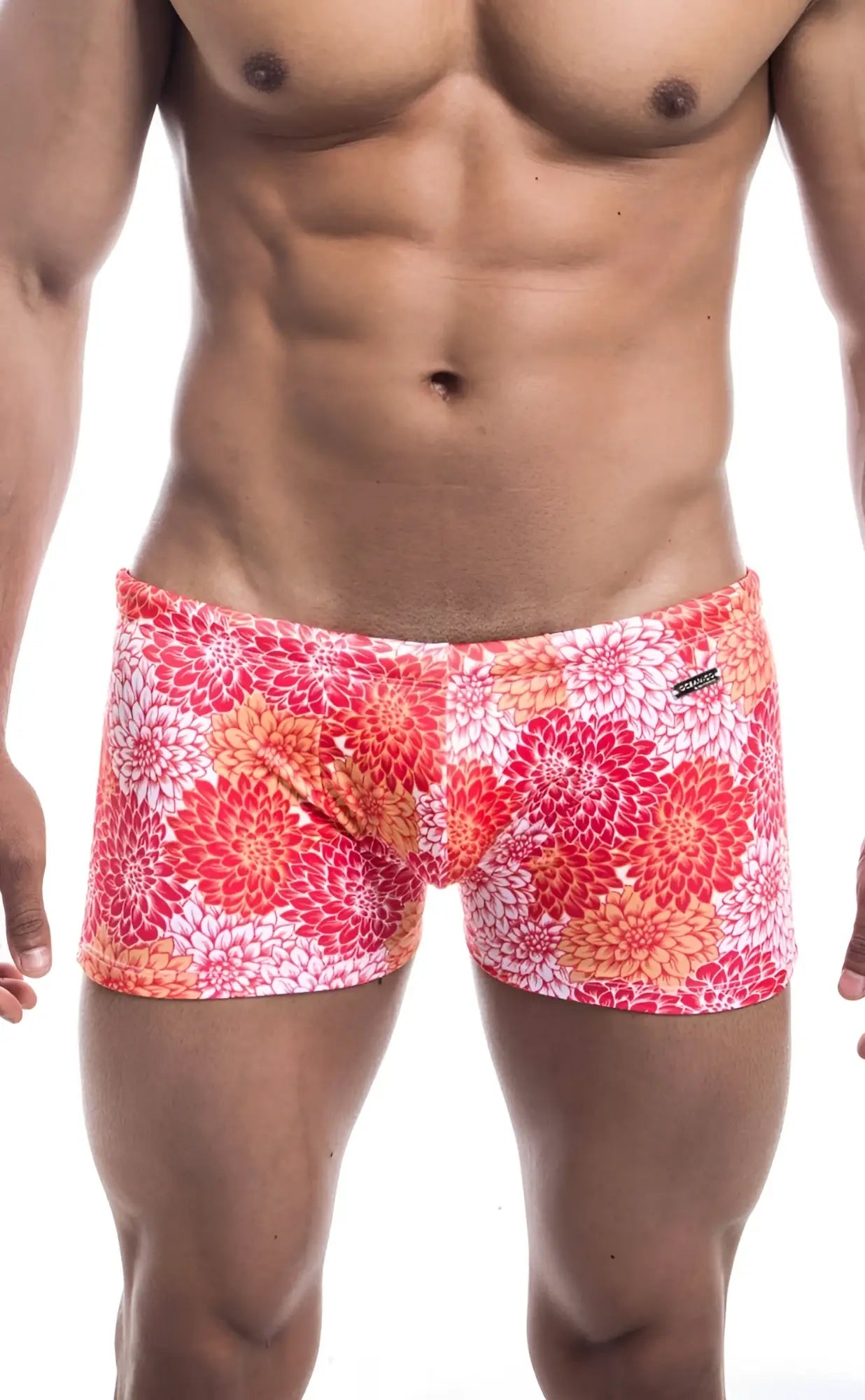 Oceanico square cut swim trunks with vibrant pink red and orange floral pattern perfect for beachwear