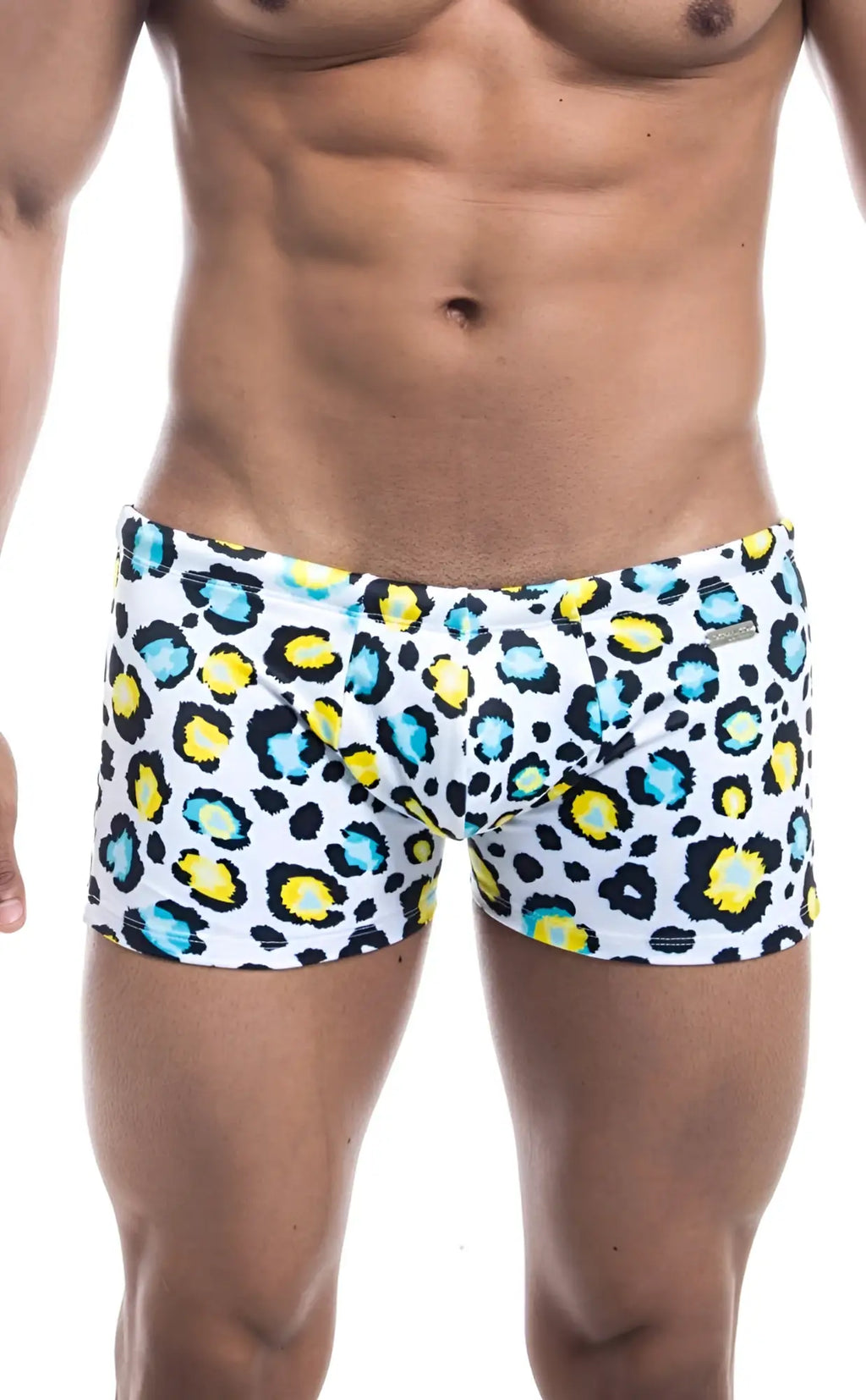 White swim trunks oceanico square cut with bold black yellow and teal leopard print pattern