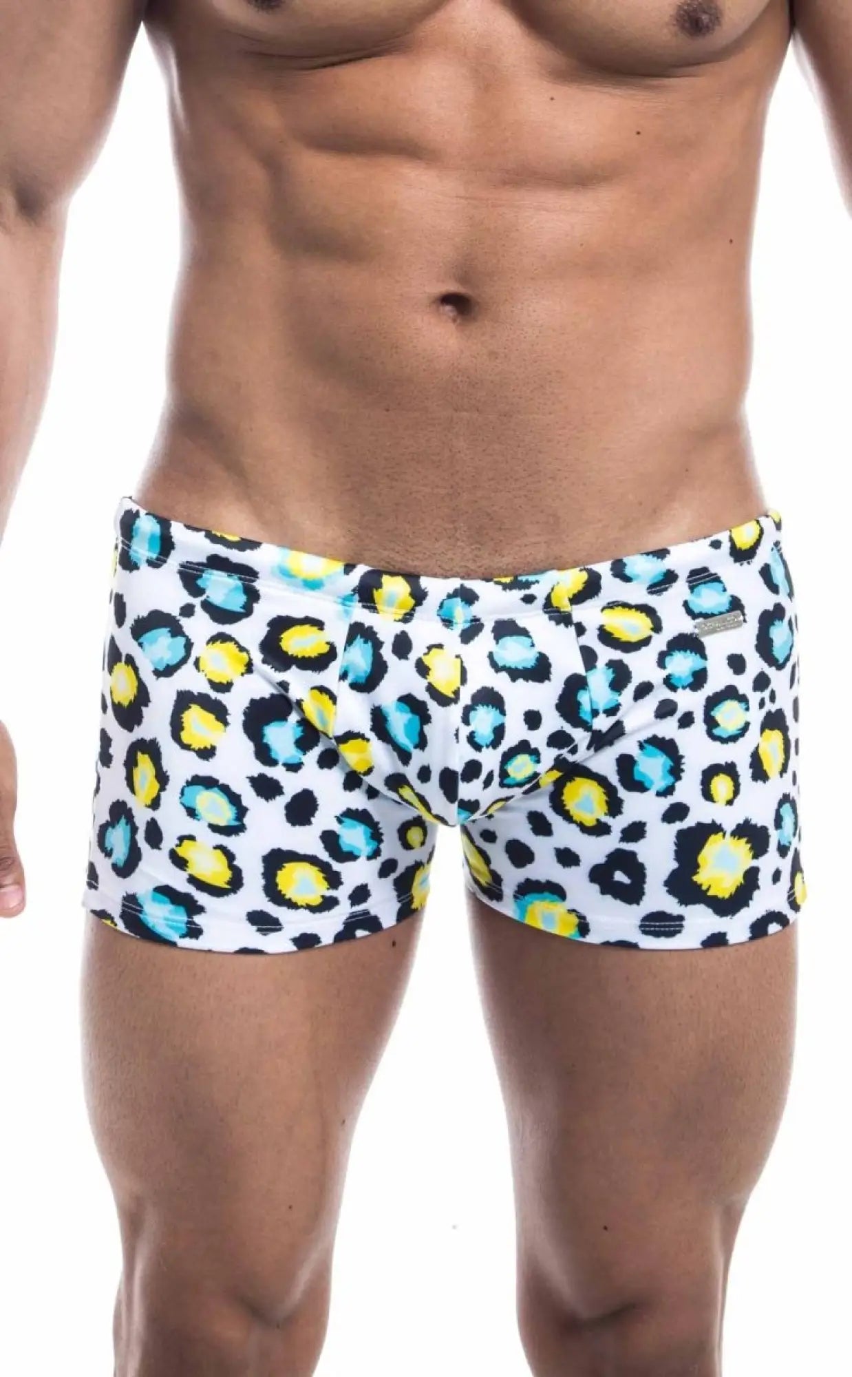 White swim trunks oceanico square cut with bold black yellow and teal leopard print pattern