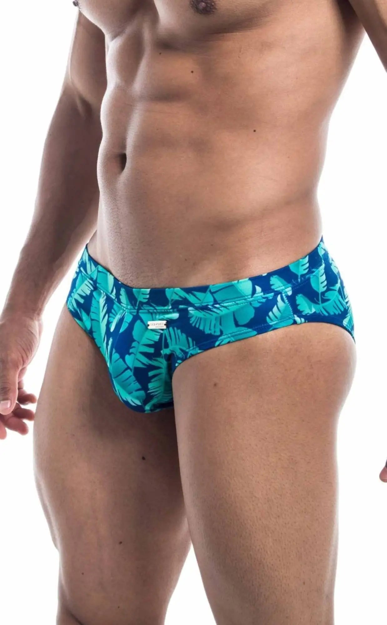 Oceanico swim bikini blue swim trunks with vibrant tropical teal and turquoise leaf pattern for beachwear