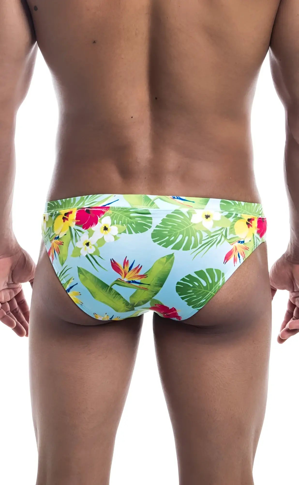 Oceanico Swim Bikini brightly colored tropical print swim trunks in light blue with green leaves and red yellow flowers