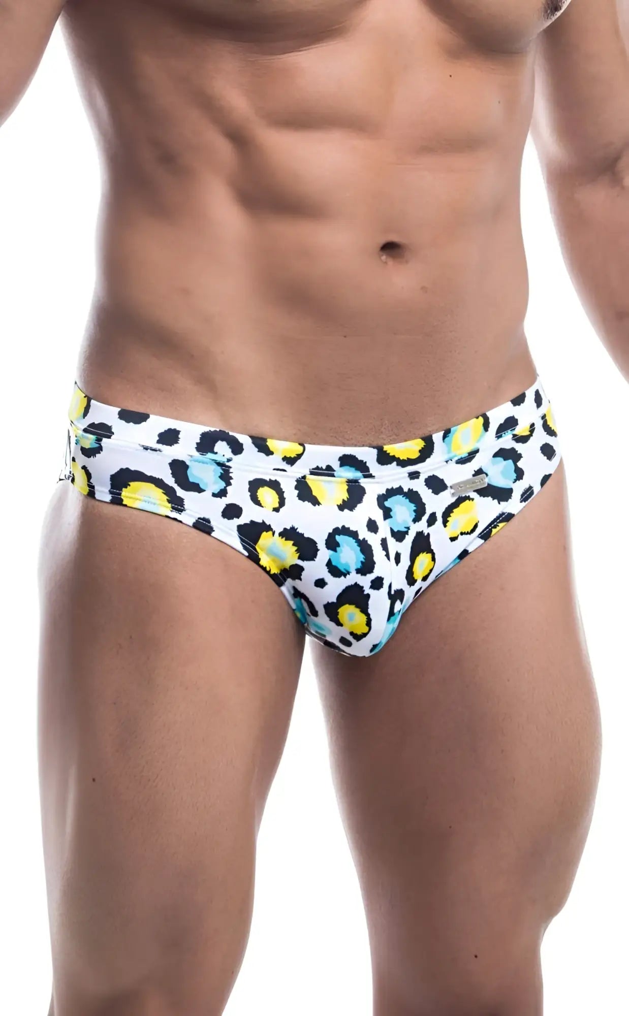 White Oceanico swim trunks with bold leopard print featuring yellow and light blue spots for beachwear use