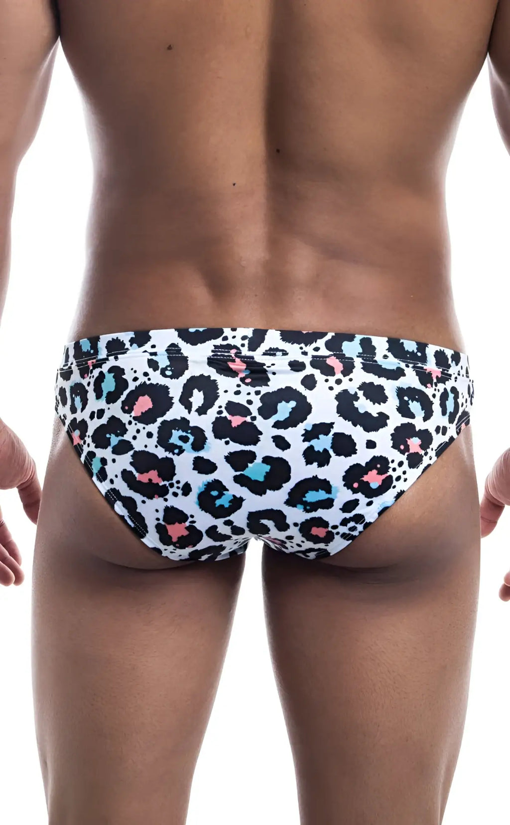 White oceanico swim trunks with bold leopard print black spots pink and light blue accents for beachwear