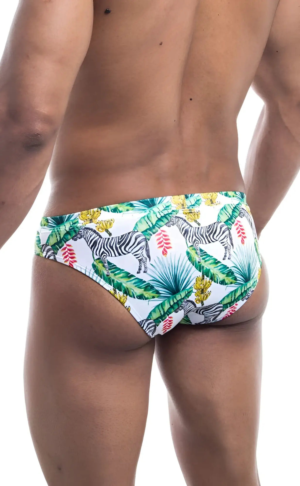 White Oceanico swim bikini trunks with vibrant tropical pattern featuring zebras green palm leaves and pink flowers