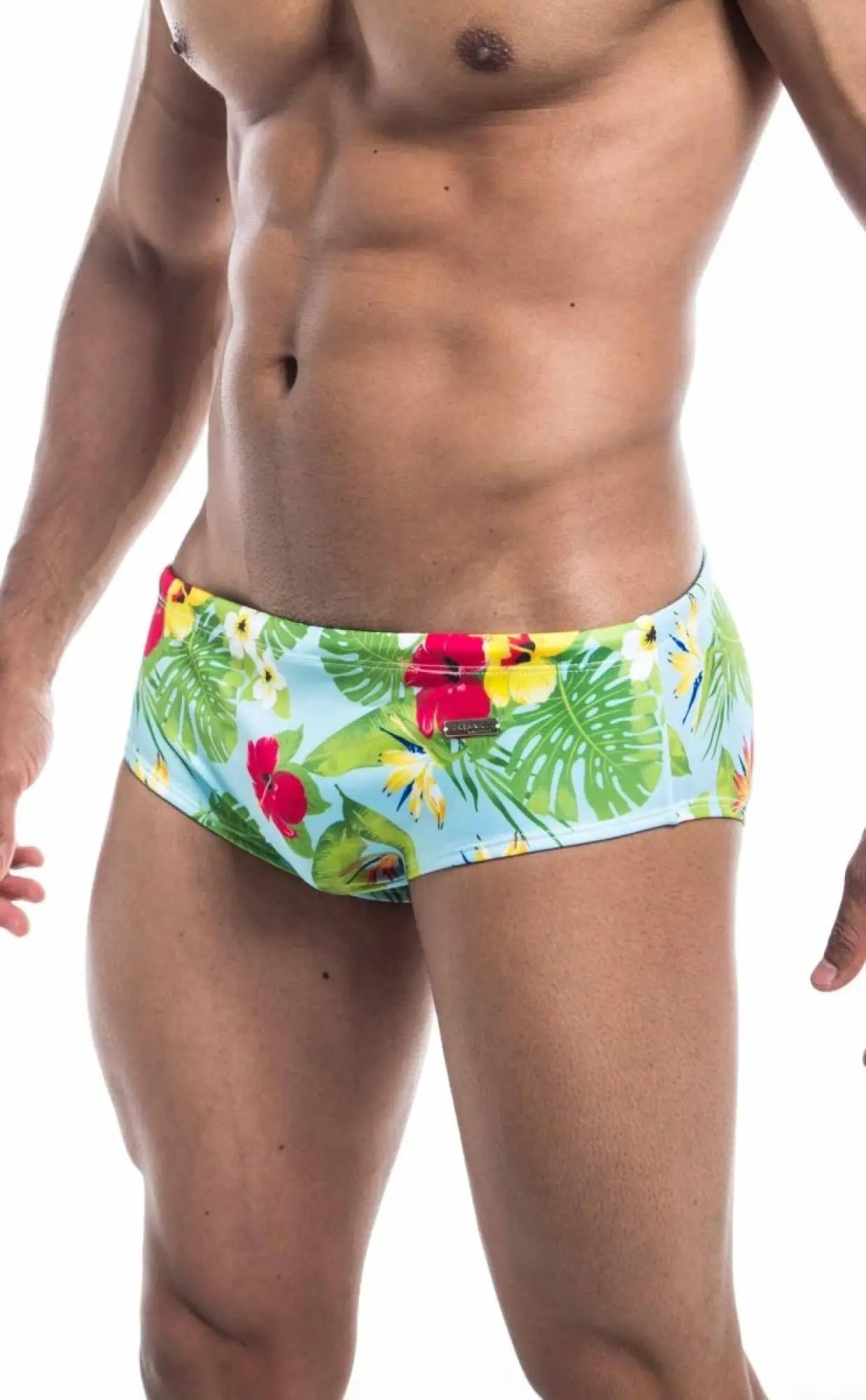 Oceanico swim brief featuring brightly colored tropical print swim trunks in light blue green red and yellow perfect for beachwear