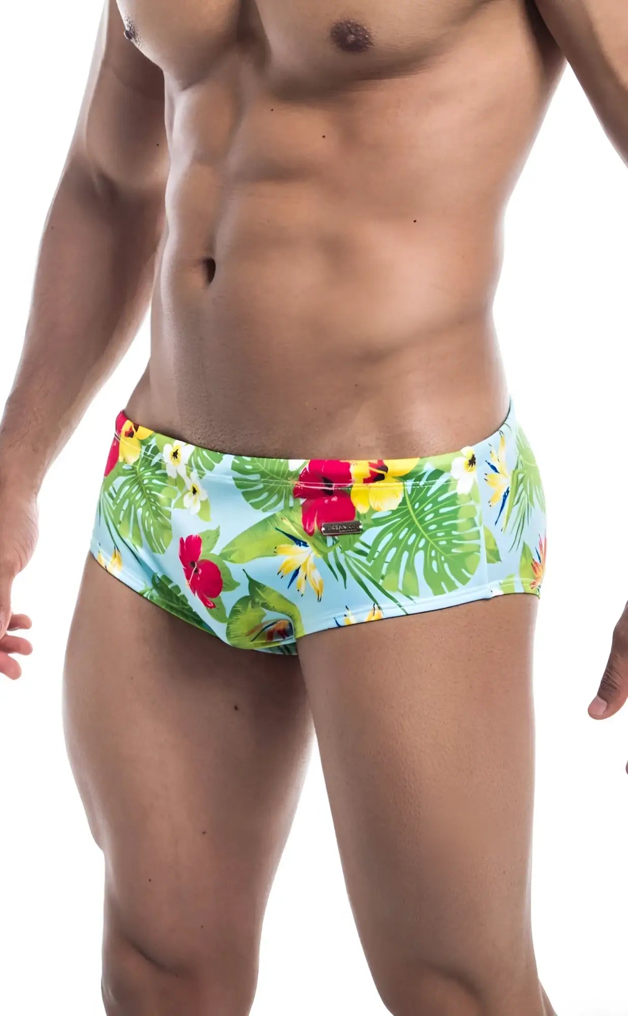 Oceanico swim brief featuring brightly colored tropical print in light blue green red and yellow perfect for beachwear
