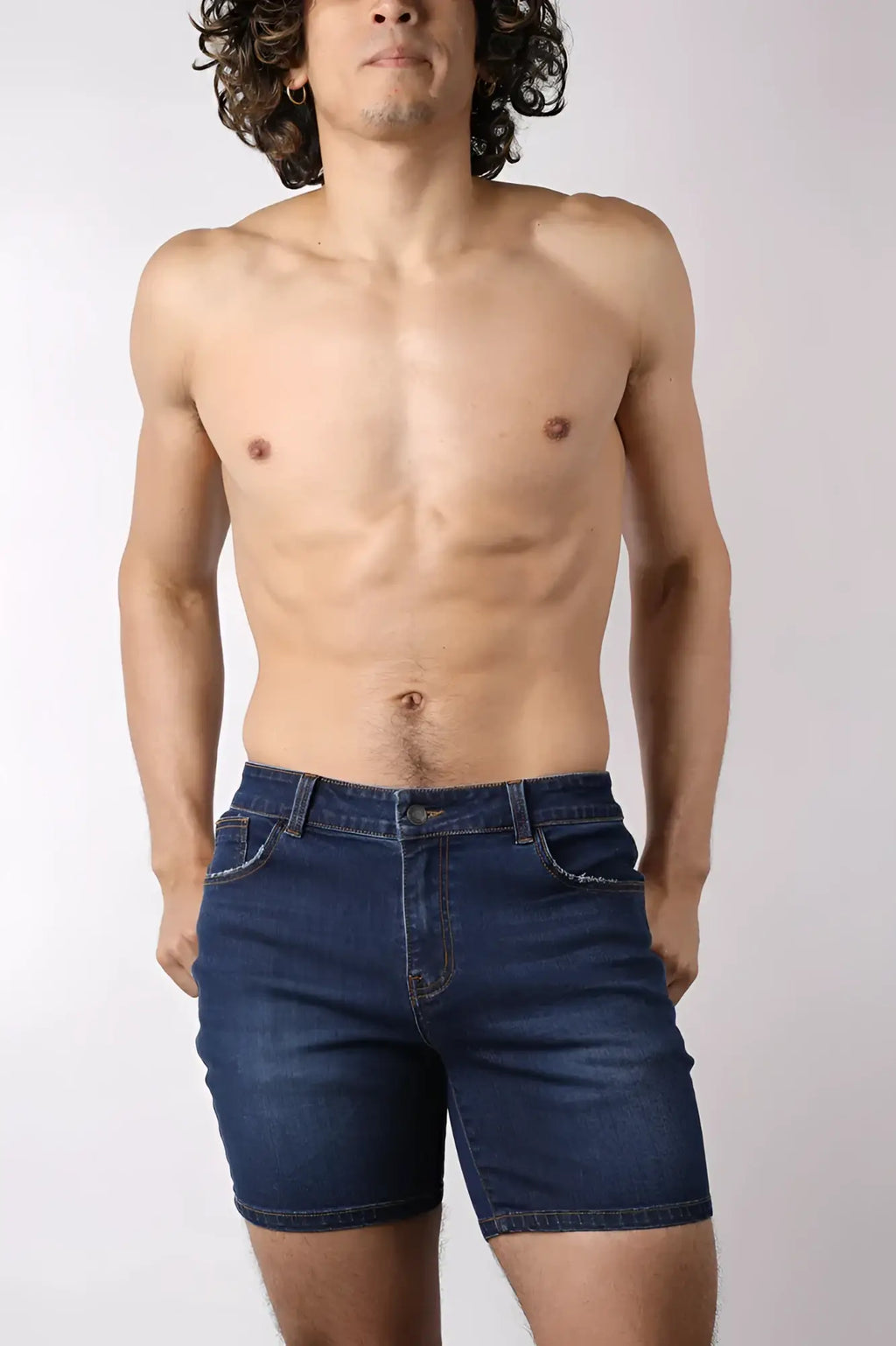 Oceanside denim short in dark blue with classic five-pocket design and stitched detailing in denim material
