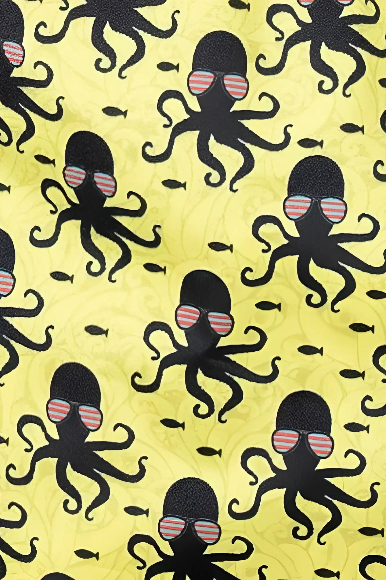Yellow octopus print swim short featuring black octopuses with striped sunglasses and small fish on fabric